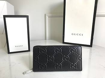 Gucci GG embossed zip around wallet 19 black leather 10387