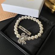 Okify MiuMiu Butterfly Charm Pearl Bracelet  - 1