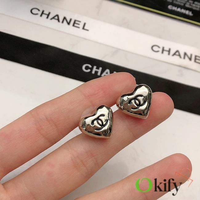 Okify CC Heart Shape Silver Earrings  - 1