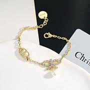 Okify Dior Gold Bracelet With Bow Charm - 1
